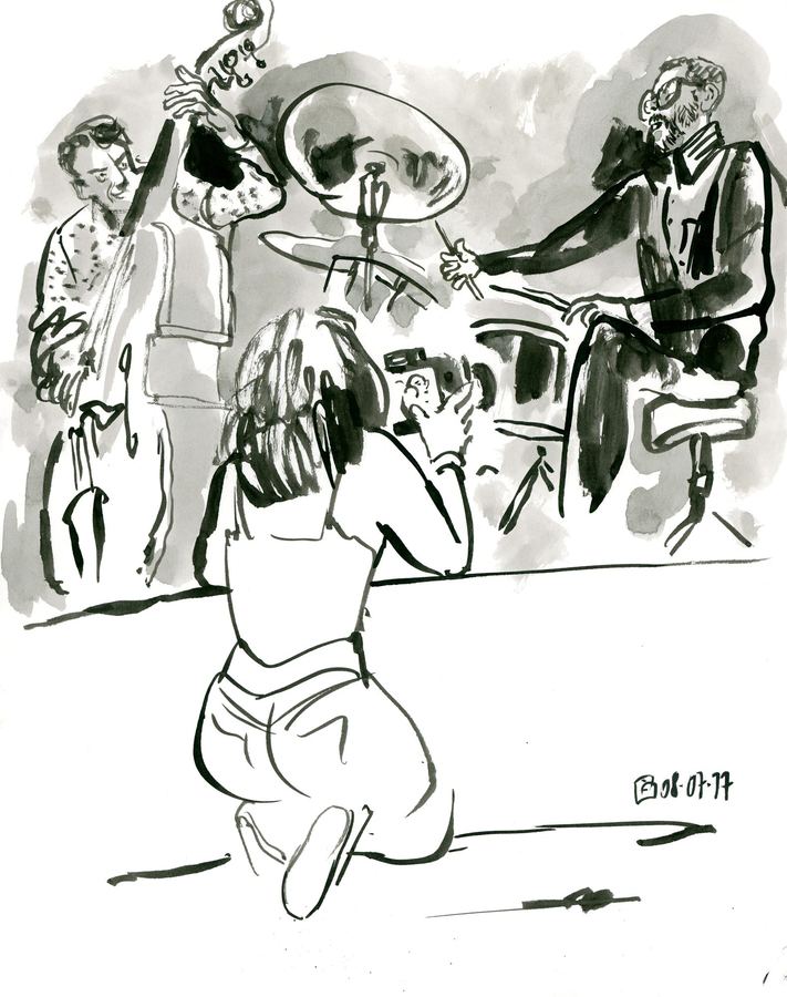 Brian Blade & John Patitucci: Double bassist and drummer, a photographer crouching in front of the stage