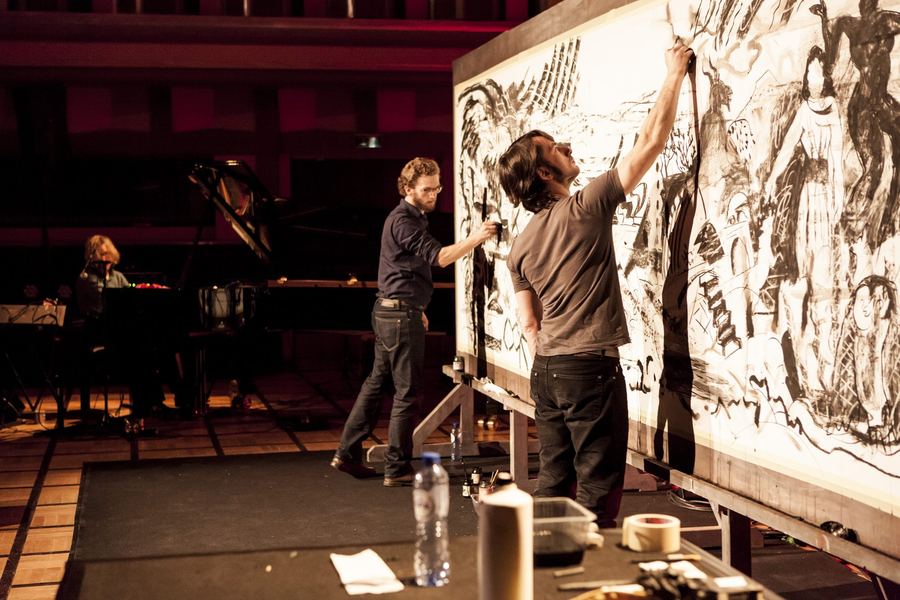 Stage photo: the drawing fills up as the performance goes on